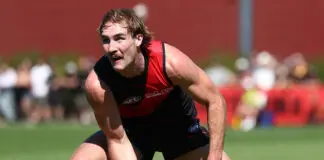 “He’ll love it”: Essendon debutant ready for baptism of fire MELBOURNE, AUSTRALIA - FEBRUARY 20: Dyson Sharp of the Bombers handpasses the ball during the 2026 AFL match simulation between the Essendon Bombers and the Richmond Tigers at the NEC Hangar on February 20, 2026 in Melbourne, Australia. (Photo by James Wiltshire/AFL Photos via Getty Images)