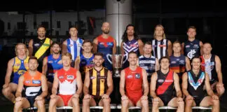 From Brownlow to Grand Final: AFL captains reveal bold 2026 calls MELBOURNE, AUSTRALIA - FEBRUARY 23: AFL Club captains and representatives Toby Nankervis of the Tigers, Nick Larkey of the Kangaroos, Max Gawn of the Demons, Alex Pearce of the Dockers, Darcy Moore of the Magpies, Patrick Cripps of the Blues (Middle row L-R) Rueben Ginbey of the Eagles, Marcus Bontempelli of the Bulldogs, Harris Andrews of the Lions, Patrick Dangerfield of the Cats, Jordan Dawson of the Crows, Callum Wilkie of the Saints (Front row L-R) Toby Greene of the Giants, Callum Mills of the Swans, Jai Newcombe of the Hawks, Noah Anderson of the Suns, Andrew McGrath of the Bombers and Connor Rozee of the Power pose for a photograph during 2026 AFL Captain's Day at Marvel Stadium on February 23, 2026 in Melbourne, Australia. (Photo by Daniel Pockett/Getty Images)