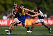AFL MRO: Trio of clubs make calls on suspensions PERTH, AUSTRALIA - FEBRUARY 29: Harry Schoenberg of the Eagles fends off during the 2026 AFL AAMI Community Series match between the West Coast Eagles and the Port Adelaide Power at Mineral Resources Park on February 29, 2026 in Perth, Australia. (Photo by Daniel Carson/AFL Photos via Getty Images)