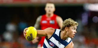 LATE CHANGE FINAL TEAMS: Geelong vs Sydney – Round 11, 2026 GOLD COAST, AUSTRALIA - MARCH 6: Tanner Bruhn of the Cats in action during the 2026 AFL Opening Round match between the Gold Coast Suns and the Geelong Cats at People First Stadium on March 6, 2026 in the Gold Coast, Australia. (Photo by Russell Freeman/AFL Photos via Getty Images)