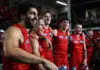 GOLD COAST, AUSTRALIA - MARCH 6: Zeke Uwland and Christian Petracca of the Suns get a gatorade shower during the 2026 AFL Opening Round match between the Gold Coast Suns and the Geelong Cats at People First Stadium on March 6, 2026 in the Gold Coast, Australia. (Photo by James Wiltshire/AFL Photos via Getty Images)