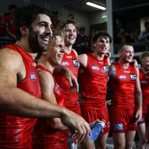 GOLD COAST, AUSTRALIA - MARCH 6: Zeke Uwland and Christian Petracca of the Suns get a gatorade shower during the 2026 AFL Opening Round match between the Gold Coast Suns and the Geelong Cats at People First Stadium on March 6, 2026 in the Gold Coast, Australia. (Photo by James Wiltshire/AFL Photos via Getty Images)