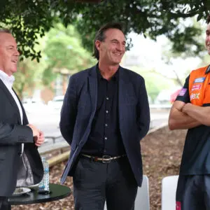 SYDNEY, AUSTRALIA - MARCH 03: Giants CEO David Matthews, AFL CEO Andrew Dillon and Josh Kelly of the GWS GIANTS speak during an AFL School Connect visit to Rosehill Public School on March 03, 2026 in Sydney, Australia. (Photo by Mark Kolbe/AFL Photos/via Getty Images)