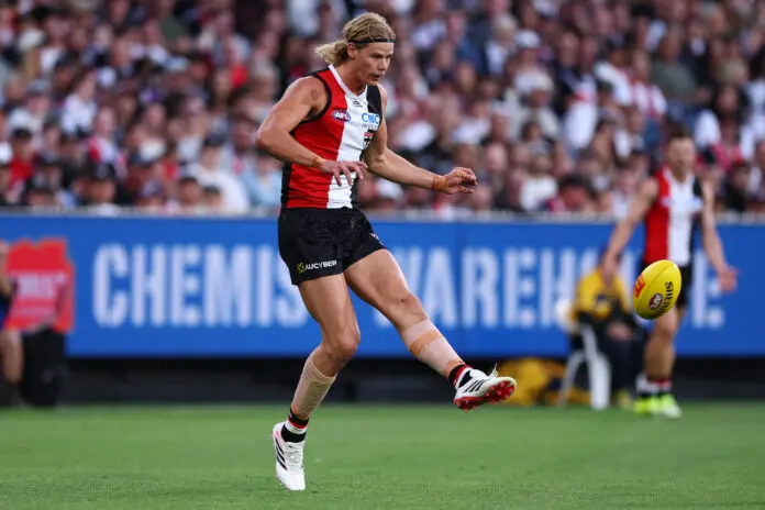 MELBOURNE, AUSTRALIA - MARCH 08: Tom De Koning of the Saints kicks the ball during the AFL Opening Round match between St Kilda Saints and Collingwood Magpies at Melbourne Cricket Ground, on March 08, 2026, in Melbourne, Australia. (Photo by Daniel Pockett/Getty Images)