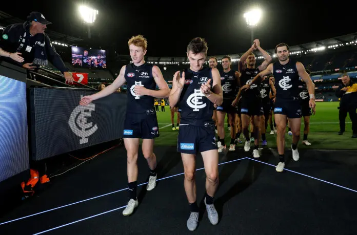 MELBOURNE, AUSTRALIA - MARCH 12: Harry Dean (left) and Jagga Smith of the Blues celebrate during the 2026 AFL Round 01 match between the Carlton Blues and the Richmond Tigers at the Melbourne Cricket Ground on March 12, 2026 in Melbourne, Australia. (Photo by Michael Willson/AFL Photos via Getty Images)