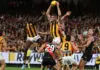MELBOURNE, AUSTRALIA - MARCH 13: Ned Reeves of the Hawks marks the ball during the 2026 AFL Round 01 match between the Essendon Bombers and the Hawthorn Hawks at the Melbourne Cricket Ground on March 13, 2026 in Melbourne, Australia. (Photo by James Wiltshire/AFL Photos via Getty Images)