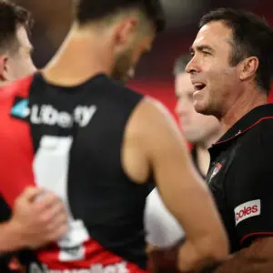 MELBOURNE, AUSTRALIA - MARCH 13: Brad Scott, Senior Coach of the Bombers during the 2026 AFL Round 01 match between the Essendon Bombers and the Hawthorn Hawks at the Melbourne Cricket Ground on March 13, 2026 in Melbourne, Australia. (Photo by James Wiltshire/AFL Photos via Getty Images)