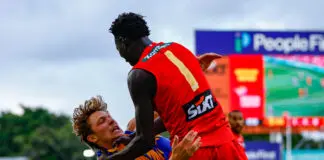 “Pull his head in”: Fiery Gold Coast defender called out by Hardwick GOLD COAST, AUSTRALIA - MARCH 15: Mac Andrew of the Suns throws Milan Murdock of the Eagles to the ground during the 2026 AFL Round 01 match between the Gold Coast Suns and the West Coast Eagles at People First Stadium on March 15, 2026 in the Gold Coast, Australia. (Photo by Russell Freeman/AFL Photos via Getty Images)