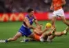MELBOURNE, AUSTRALIA - MARCH 14: Tom Liberatore of the Bulldogs (L) tackles Toby Greene of the Giants during the round one AFL match between Western Bulldogs and Greater Western Sydney Giants at Marvel Stadium on March 14, 2026 in Melbourne, Australia. (Photo by Graham Denholm/Getty Images)