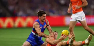 Marvel thumping Vol II: Kingsley’s Giants smashed in sequel against Dogs MELBOURNE, AUSTRALIA - MARCH 14: Tom Liberatore of the Bulldogs (L) tackles Toby Greene of the Giants during the round one AFL match between Western Bulldogs and Greater Western Sydney Giants at Marvel Stadium on March 14, 2026 in Melbourne, Australia. (Photo by Graham Denholm/Getty Images)