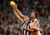 MELBOURNE, AUSTRALIA - MARCH 14: Darcy Cameron of the Magpies and Lachlan McAndrew of the Crows compete in the ruck during the round one AFL match between Collingwood Magpies and Adelaide Crows at Melbourne Cricket Ground, on March 14, 2026, in Melbourne, Australia. (Photo by Quinn Rooney/Getty Images)
