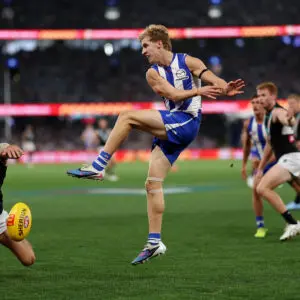 MELBOURNE, AUSTRALIA - MARCH 15: Connor Rozee of the Power smothers a kick from Dylan Stephens of the Kangaroos during the round one AFL match between North Melbourne Kangaroos and Port Adelaide Power at Marvel Stadium, on March 15, 2026, in Melbourne, Australia. (Photo by Morgan Hancock/Getty Images)