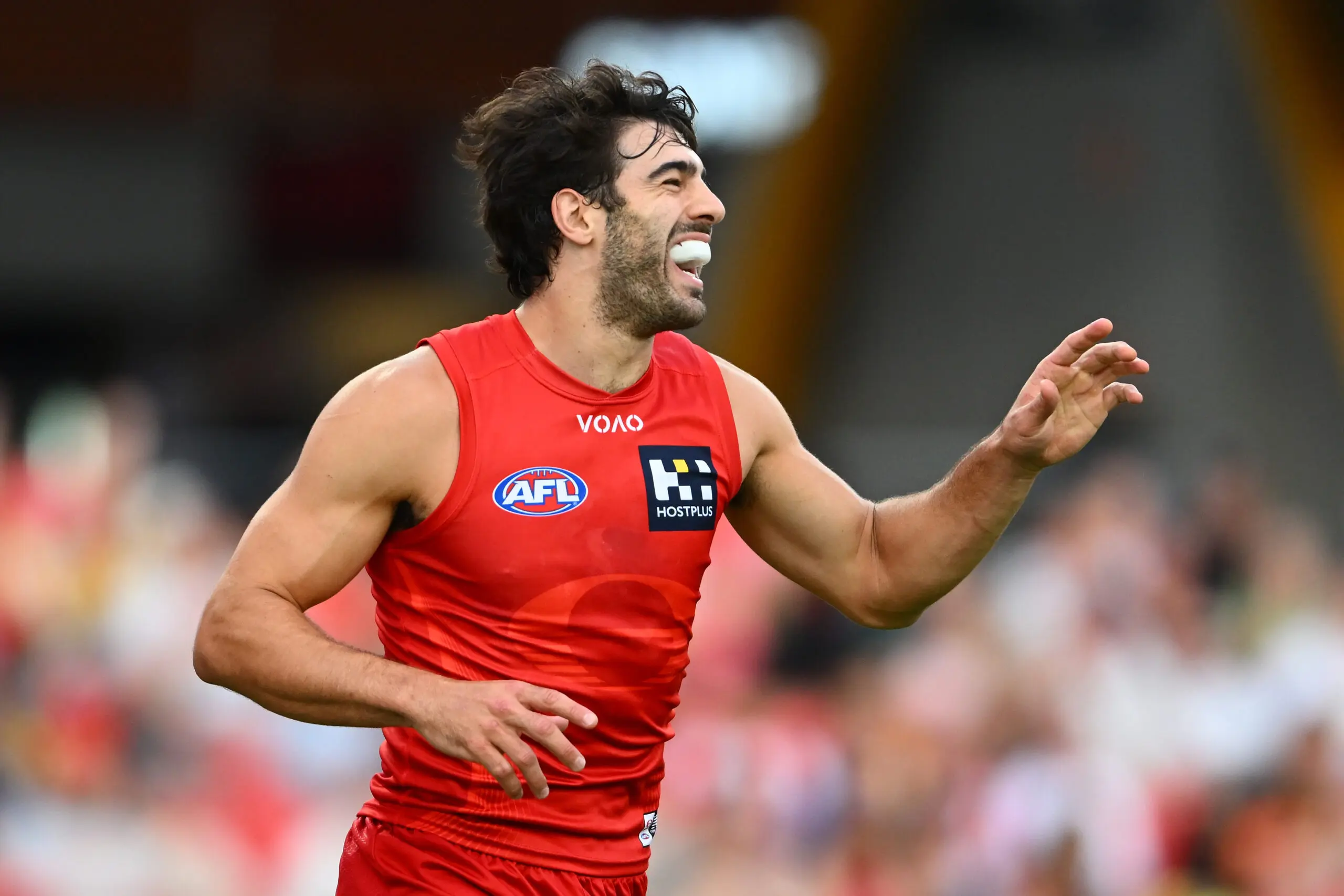 GOLD COAST, AUSTRALIA - MARCH 15: Christian Petracca of the Suns celebrates kicking a goal during the round one AFL match between Gold Coast Suns and West Coast Eagles at People First Stadium, on March 15, 2026, in Gold Coast, Australia. (Photo by Matt Roberts/AFL Photos/via Getty Images)