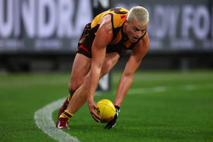 MELBOURNE, AUSTRALIA - MARCH 19: Jack Ginnivan of the Hawks gathers the ball during the round two AFL match between Hawthorn Hawks and Sydney Swans at Melbourne Cricket Ground, on March 19, 2026, in Melbourne, Australia. (Photo by Daniel Pockett/Getty Images)