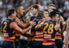 ADELAIDE, AUSTRALIA - MARCH 20: Jordon Butts of the Crows 
 celebrates a goal with his team mates during the round two AFL match between Adelaide Crows and Western Bulldogs at Adelaide Oval, on March 20, 2026, in Adelaide, Australia. (Photo by Mark Brake/Getty Images)