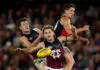 MELBOURNE, AUSTRALIA - MARCH 28: (L-R) Josh Dunkley of the Lions, Will Ashcroft of the Lions and Liam Stocker of the Saints compete for the ball during the 2026 AFL Round 03 match between the St Kilda Saints and the Brisbane Lions at Marvel Stadium on March 28, 2026 in Melbourne, Australia. (Photo by Michael Willson/AFL Photos via Getty Images)