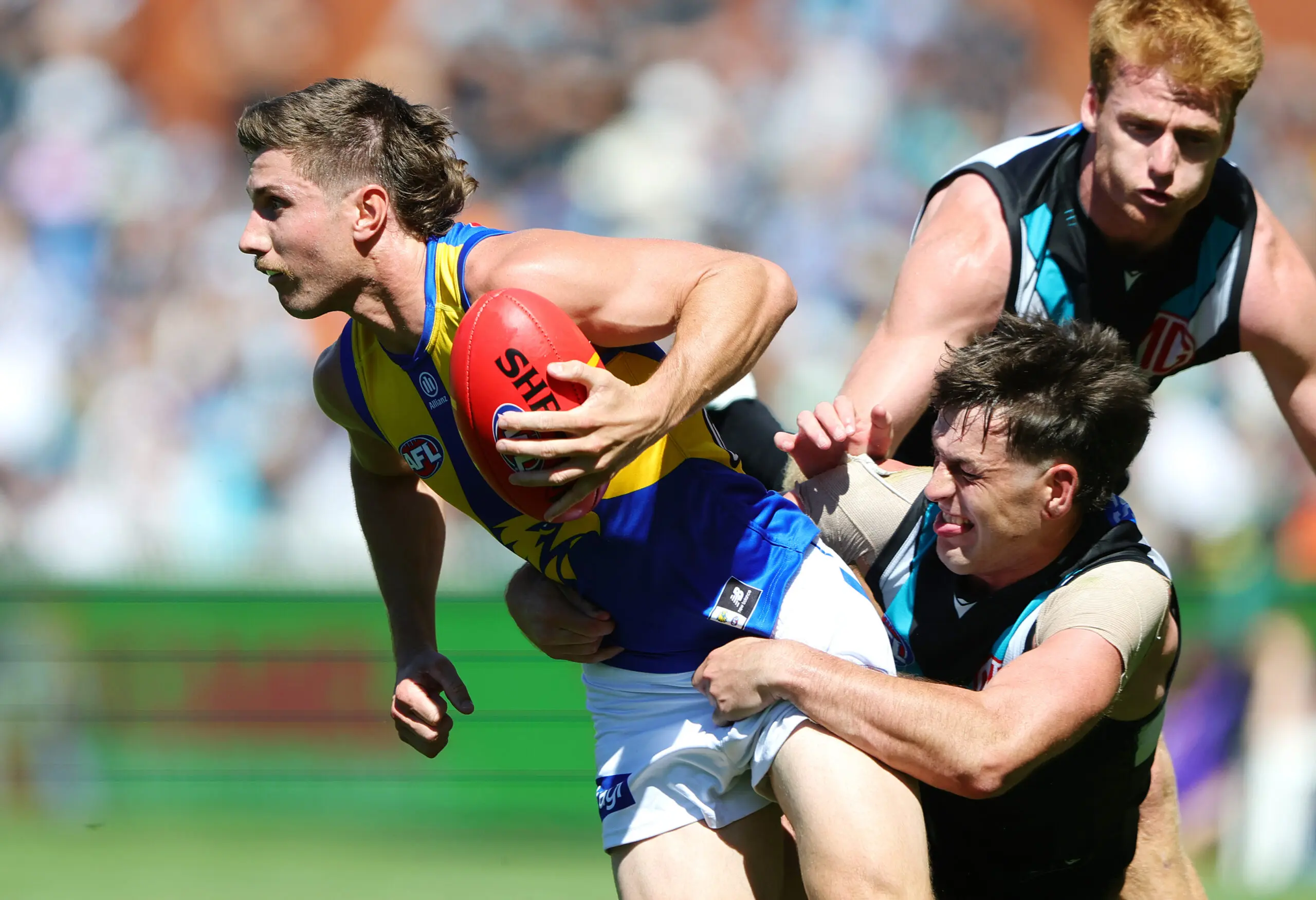 ADELAIDE, AUSTRALIA - MARCH 29: Liam Baker of the Eagles and Zak Butters of the Power during the 2026 AFL Round 03 match between the Port Adelaide Power and the West Coast Eagles at Adelaide Oval on March 29, 2026 in Adelaide, Australia. (Photo by Sarah Reed/AFL Photos via Getty Images)