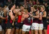 MELBOURNE, AUSTRALIA - MARCH 28: Players wrestle during the round three AFL match between St Kilda Saints and Brisbane Lions at Marvel Stadium, on March 28, 2026, in Melbourne, Australia. (Photo by Quinn Rooney/Getty Images)