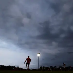 SYDNEY, AUSTRALIA - FEBRUARY 12:  Storm clouds roll over the field during the Greater Western Sydney Giants AFL intra-club match at Blacktown International Sportspark on February 12, 2014 in Sydney, Australia.  (Photo by Mark Nolan/Getty Images)