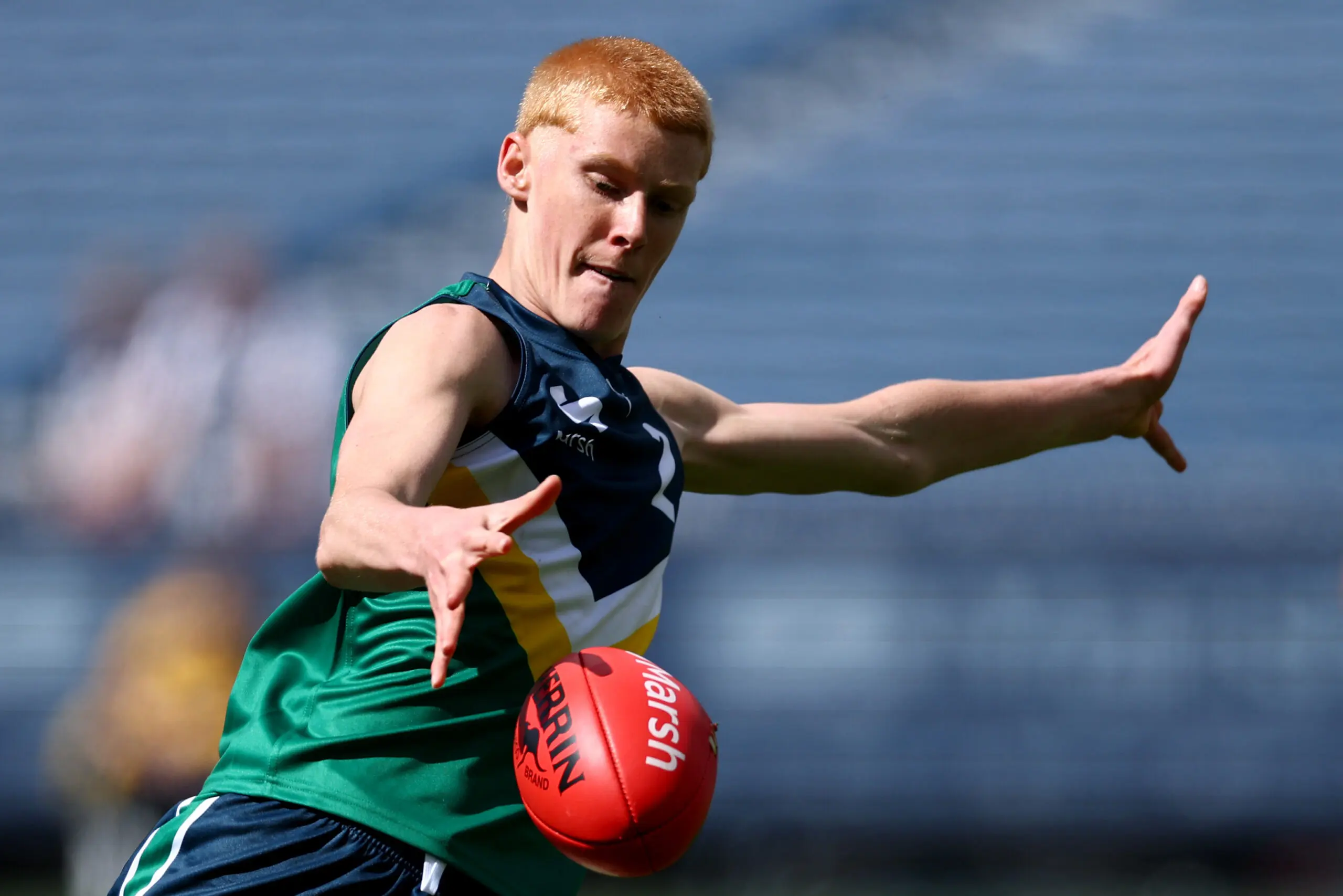 MELBOURNE, AUSTRALIA - SEPTEMBER 27: Gabriel Patterson of Team Docherty kicks during the Marsh AFL National Futures Boys match between Team Boak and Team Docherty at Melbourne Cricket Ground, on September 27, 2025 in Melbourne, Australia. (Photo by Josh Chadwick/AFL Photos)