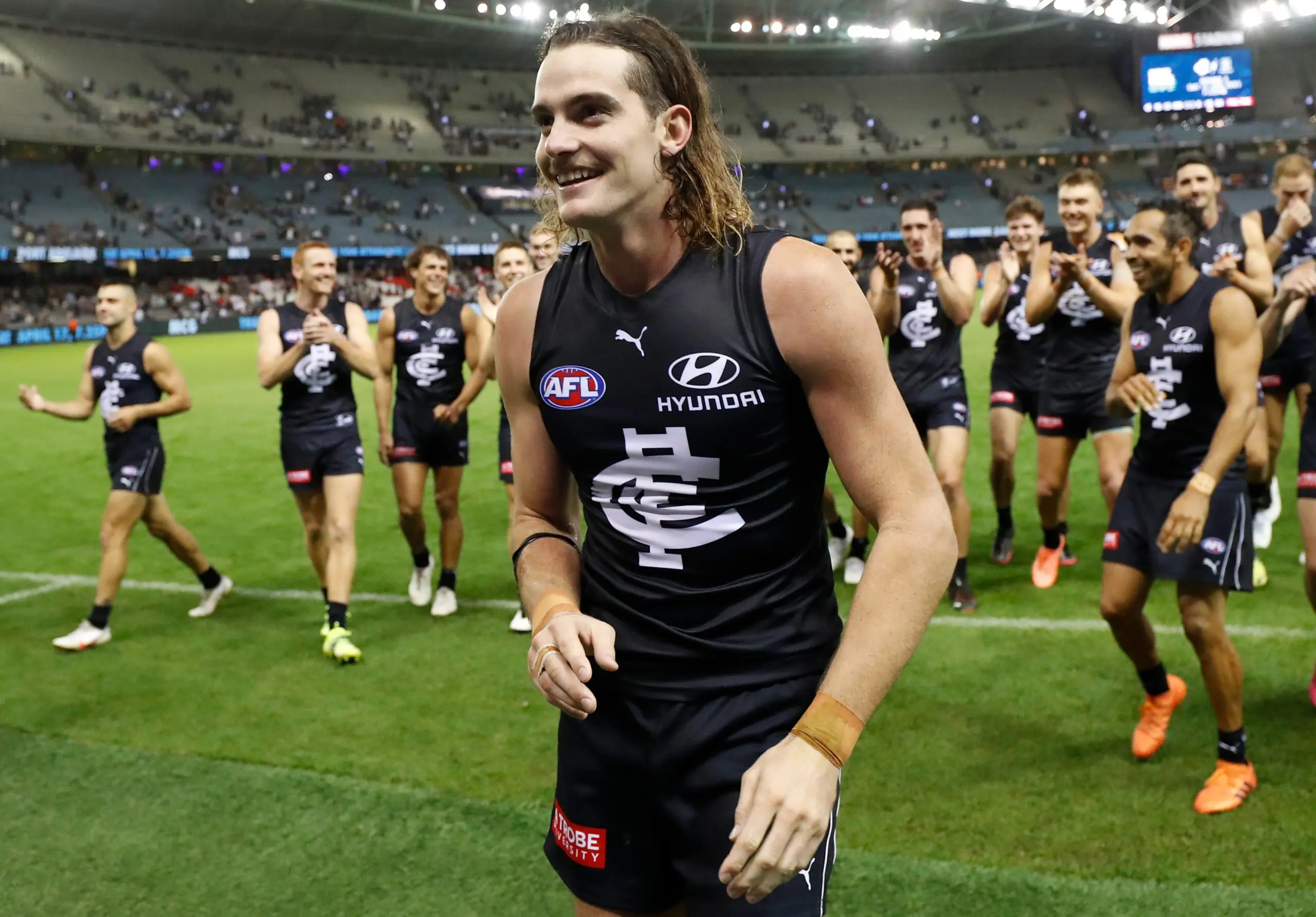 MELBOURNE, AUSTRALIA - APRIL 04: Debutant Luke Parks of the Blues leads the team off the field during the 2021 AFL Round 03 match between the Carlton Blues and the Fremantle Dockers at Marvel Stadium on April 04, 2021 in Melbourne, Australia. (Photo by Michael Willson/AFL Photos via Getty Images)
