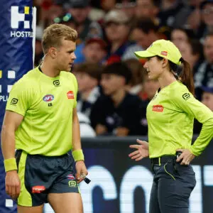 MELBOURNE, AUSTRALIA - APRIL 13: AFL Field Umpire, Nathan Williamson and AFL Goal Umpire, Chelsea Roffey are seen during the 2024 AFL Round 05 match between the Carlton Blues and the Adelaide Crows at Marvel Stadium on April 13, 2024 in Melbourne, Australia. (Photo by Dylan Burns/AFL Photos via Getty Images)