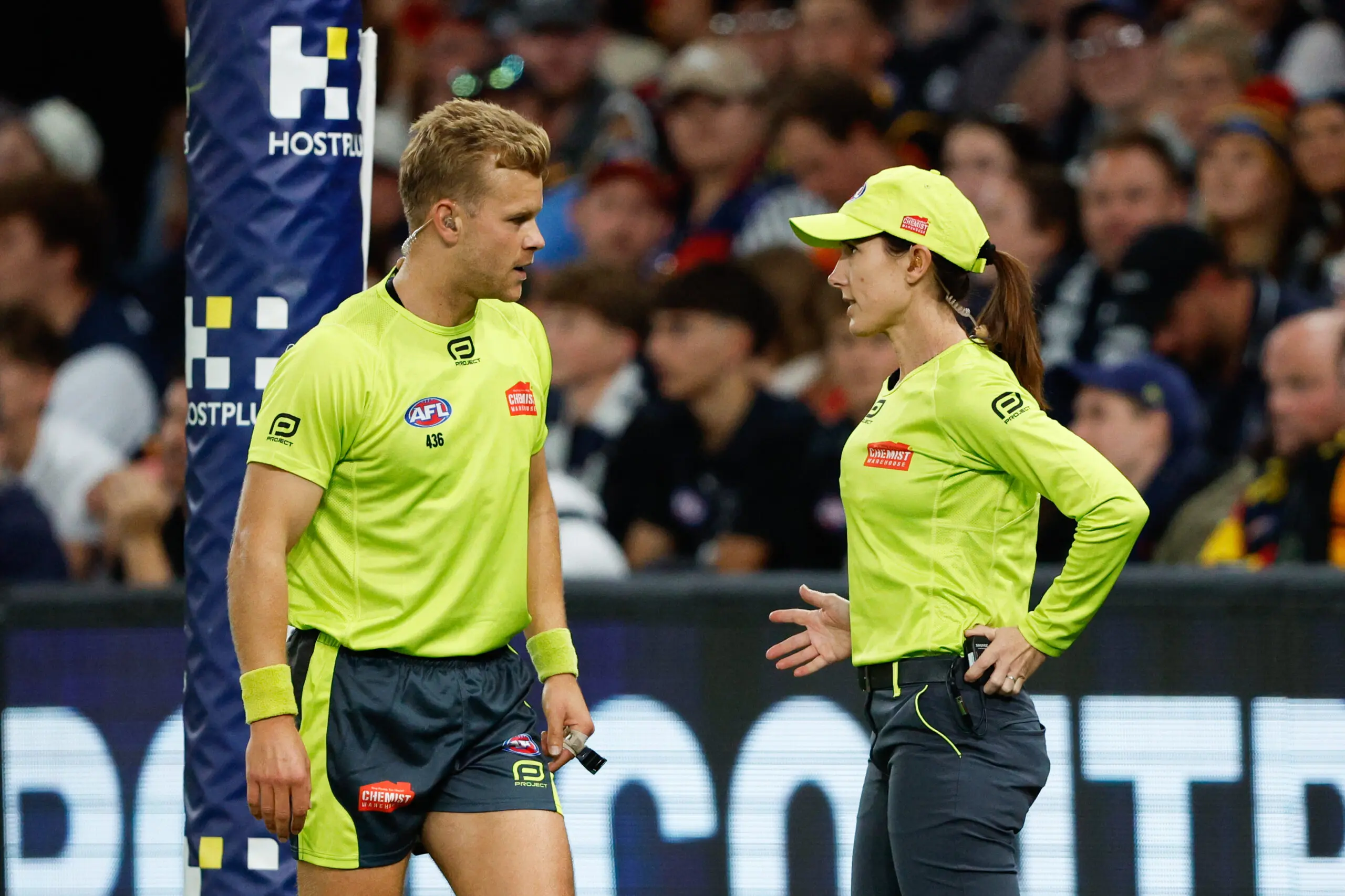 MELBOURNE, AUSTRALIA - APRIL 13: AFL Field Umpire, Nathan Williamson and AFL Goal Umpire, Chelsea Roffey are seen during the 2024 AFL Round 05 match between the Carlton Blues and the Adelaide Crows at Marvel Stadium on April 13, 2024 in Melbourne, Australia. (Photo by Dylan Burns/AFL Photos via Getty Images)