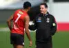 MELBOURNE, AUSTRALIA - JUNE 04: Ross Lyon, Senior Coach of the Saints speaks to Nasiah Wanganeen-Milera of the Saints during a St Kilda Saints AFL training session at RSEA Park on June 04, 2024 in Melbourne, Australia. (Photo by Quinn Rooney/Getty Images)