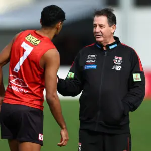 MELBOURNE, AUSTRALIA - JUNE 04: Ross Lyon, Senior Coach of the Saints speaks to Nasiah Wanganeen-Milera of the Saints during a St Kilda Saints AFL training session at RSEA Park on June 04, 2024 in Melbourne, Australia. (Photo by Quinn Rooney/Getty Images)
