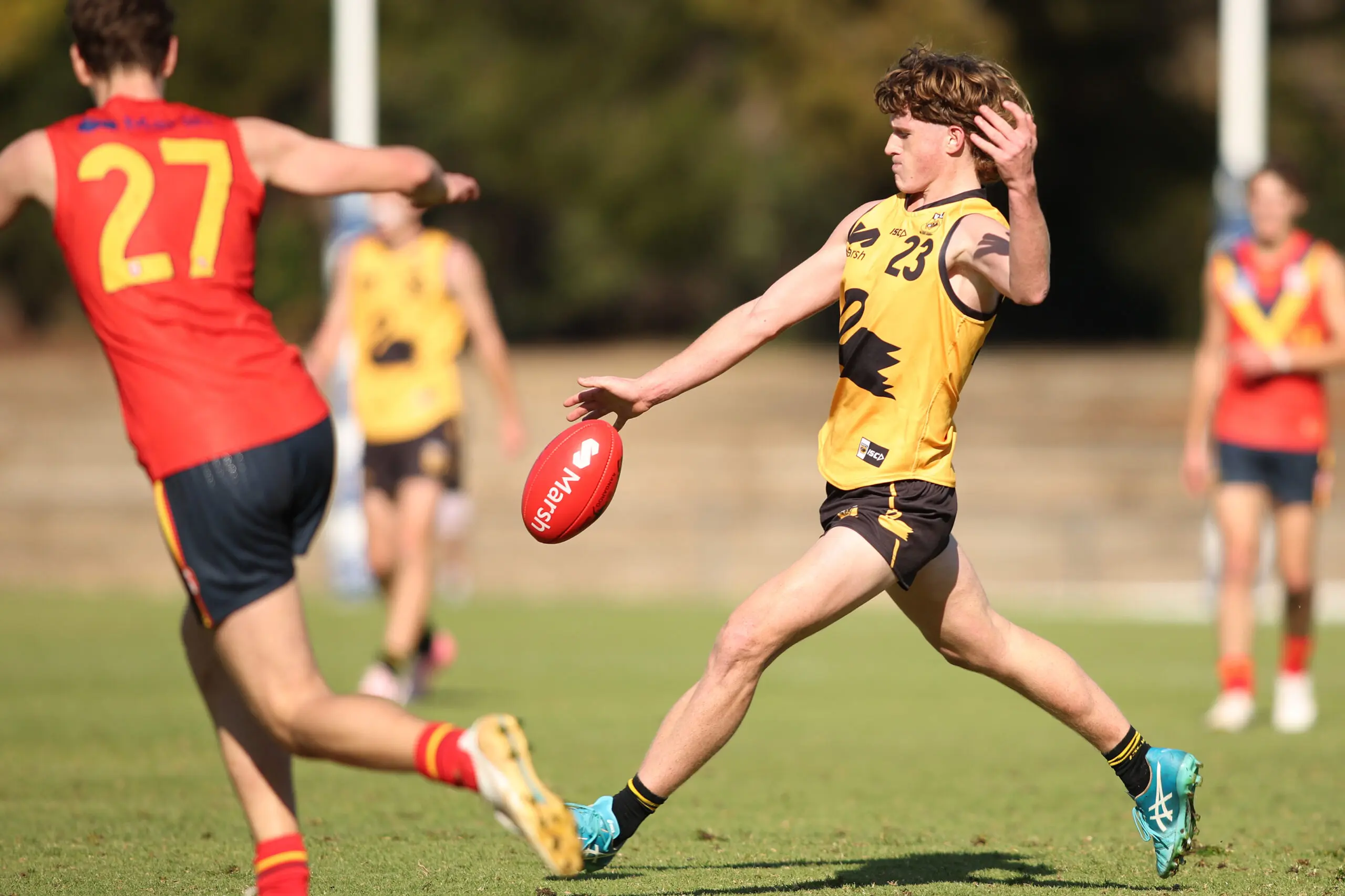 ADELAIDE, AUSTRALIA - JUNE 22: Lucas Robinson of Western Australia kicks the ball during the Marsh AFL National Development Championships match between U16 Boys South Australia and Western Australia at Thebarton Oval on June 22, 2024 in Adelaide, Australia. (Photo by Maya Thompson/AFL Photos/via Getty Images)