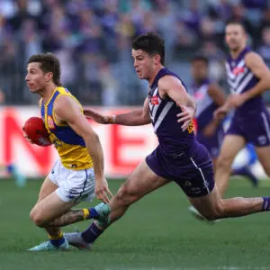 PERTH, AUSTRALIA - JULY 26: Andrew Brayshaw of the Dockers tackles Liam Baker of the Eagles during the round 20 AFL match between the Fremantle Dockers and West Coast Eagles at Optus Stadium on July 26, 2025 in Perth, Australia. (Photo by Paul Kane/Getty Images)