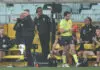 MELBOURNE, AUSTRALIA - AUGUST 09: Adem Yze, Senior Coach of the Tigers on the bench during the 2025 AFL Round 22 match between the Richmond Tigers and the St Kilda Saints at the Melbourne Cricket Ground on August 9, 2025 in Melbourne, Australia. (Photo by James Wiltshire/AFL Photos via Getty Images)