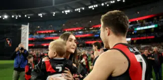 Scott addresses Alexandra Merrett Gimlet post MELBOURNE, AUSTRALIA - AUGUST 21: Zach Merrett of the Bombers is congratulated by his wife Alexandra and son Jude during his 250th game the round 24 AFL match between Essendon Bombers and Carlton Blues at Melbourne Cricket Ground on August 21, 2025 in Melbourne, Australia. (Photo by Robert Cianflone/Getty Images)
