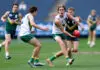 The SIX AFL Draft prospects debuting in state-league competitions MELBOURNE, AUSTRALIA - SEPTEMBER 27: Archie Van Dyk of Team Boak handballs whilst being tackled by Heath Mellody of Team Docherty during the Marsh AFL National Futures Boys match between Team Boak and Team Docherty at Melbourne Cricket Ground, on September 27, 2025 in Melbourne, Australia. (Photo by Josh Chadwick/AFL Photos/via Getty Images)