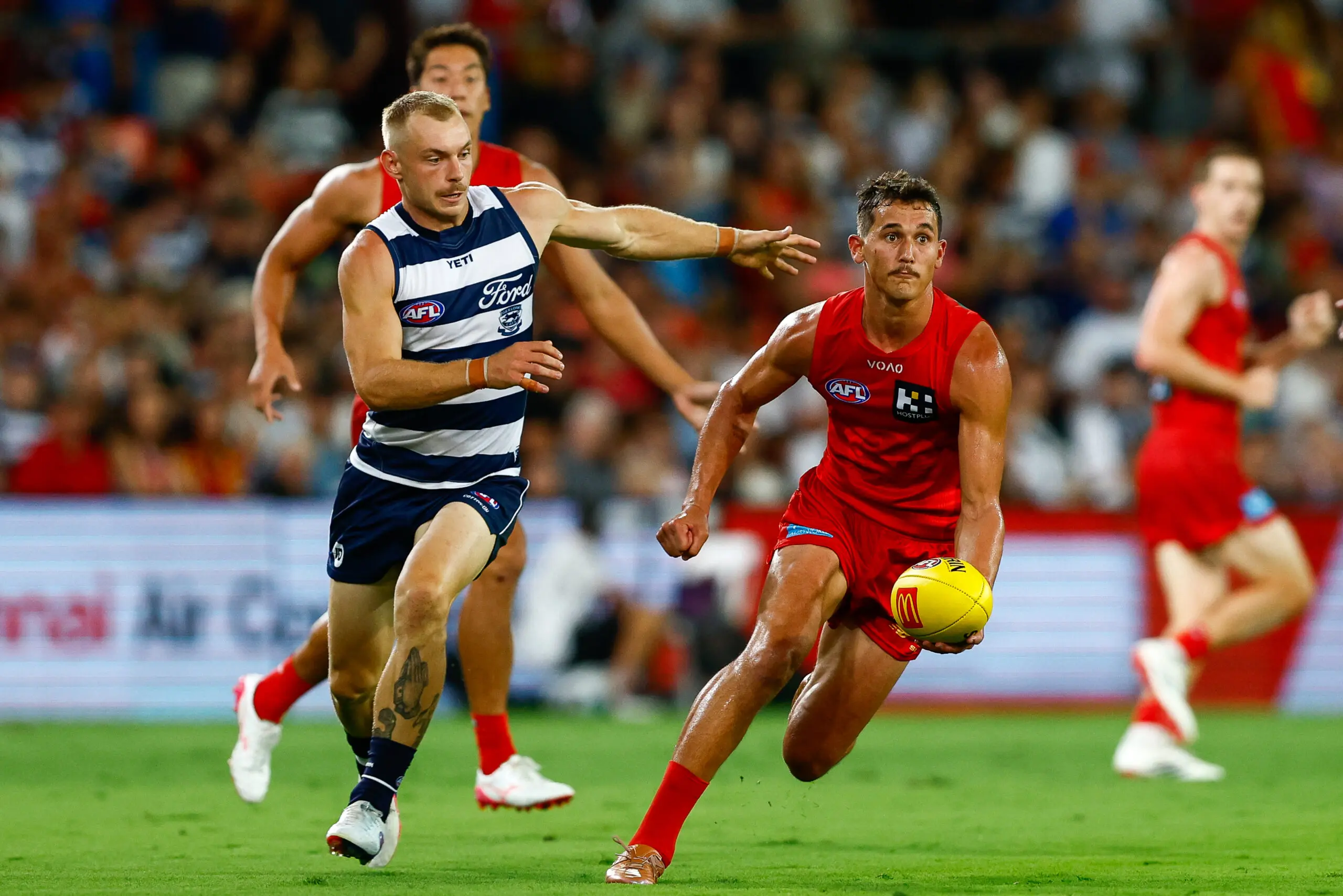 GOLD COAST, AUSTRALIA - MARCH 6: Wil Powell of the Suns in action during the 2026 AFL Opening Round match between the Gold Coast Suns and the Geelong Cats at People First Stadium on March 6, 2026 in the Gold Coast, Australia. (Photo by Russell Freeman/AFL Photos via Getty Images)