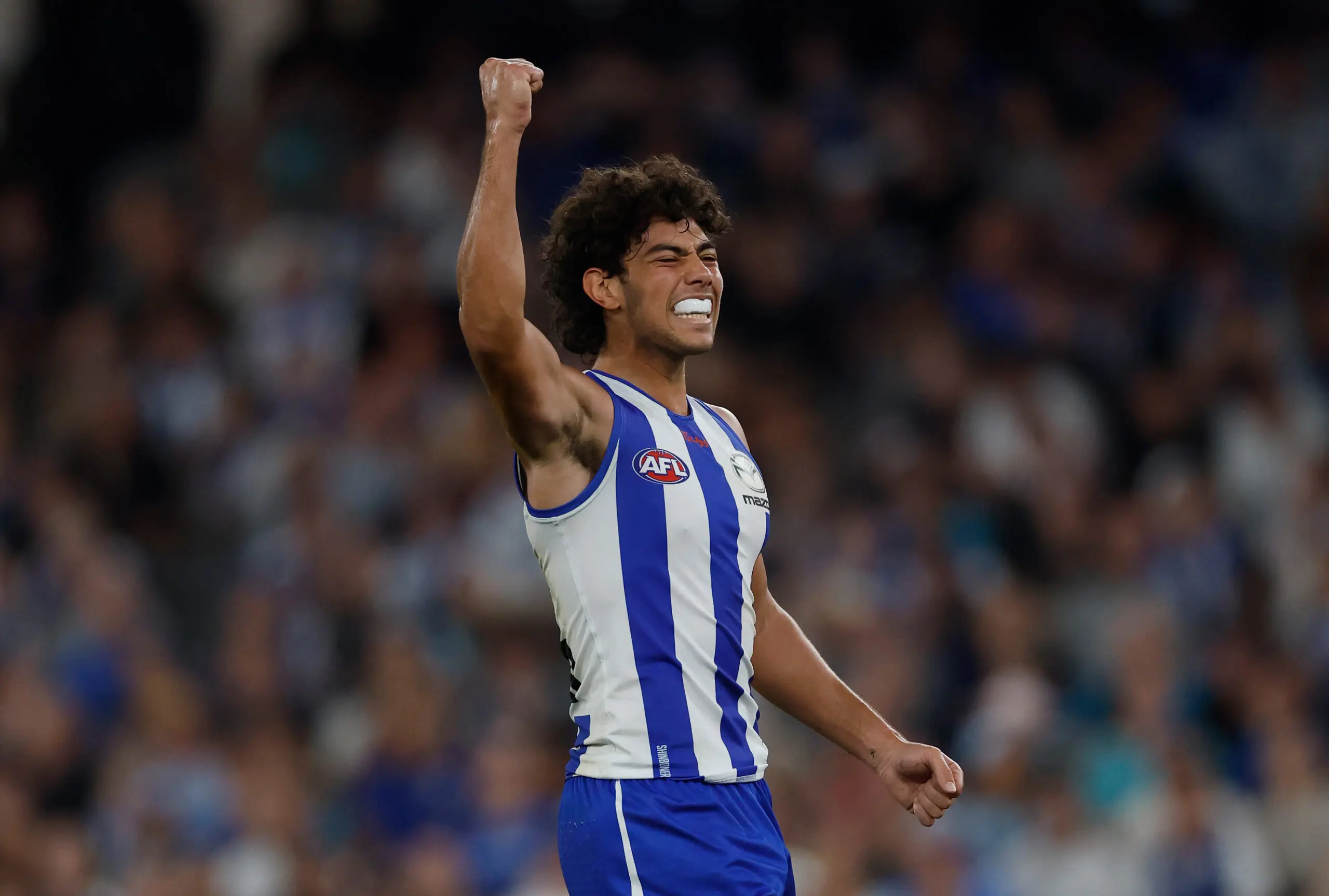 MELBOURNE, AUSTRALIA - MARCH 15: Cooper Trembath of the Kangaroos celebrates a goal during the 2026 AFL Round 01 match between the North Melbourne Kangaroos and the Port Adelaide Power at Marvel Stadium on March 15, 2026 in Melbourne, Australia. (Photo by Michael Willson/AFL Photos via Getty Images)