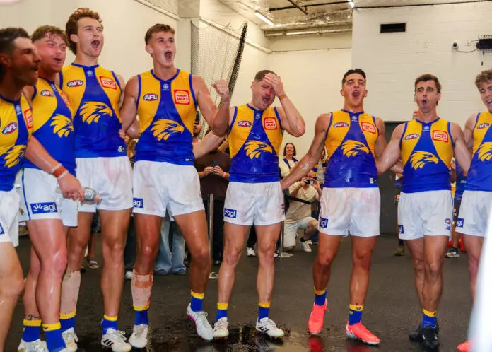ADELAIDE, AUSTRALIA - MARCH 29: Eagles players sing the song after the win during the 2026 AFL Round 03 match between the Port Adelaide Power and the West Coast Eagles at Adelaide Oval on March 29, 2026 in Adelaide, Australia. (Photo by Sarah Reed/AFL Photos via Getty Images)