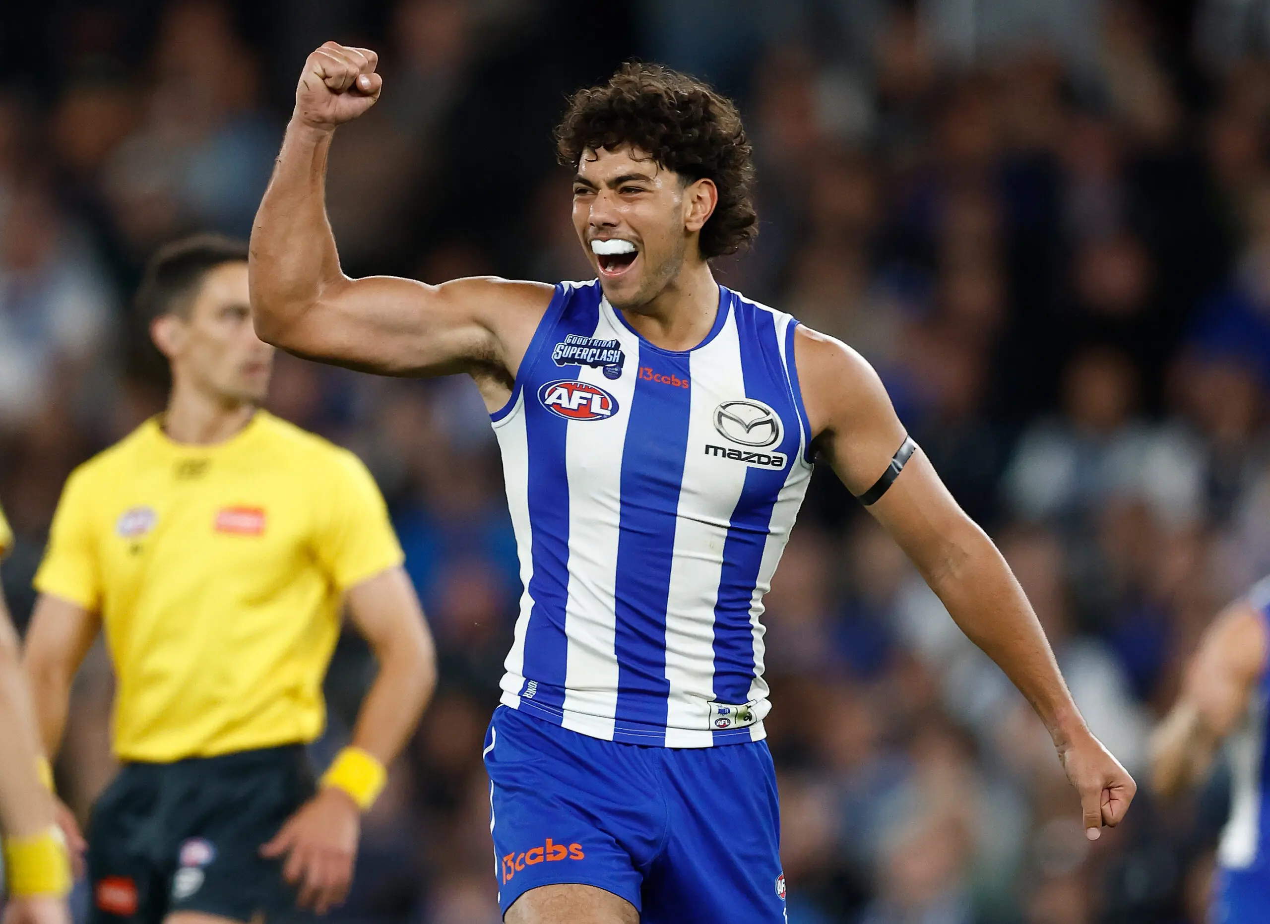 MELBOURNE, AUSTRALIA - APRIL 03: Cooper Trembath of the Kangaroos celebrates a goal during the 2026 AFL Round 04 match between the North Melbourne Kangaroos and the Carlton Blues at Marvel Stadium on April 3, 2026 in Melbourne, Australia. (Photo by Michael Willson/AFL Photos via Getty Images)