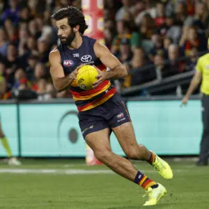 ADELAIDE, AUSTRALIA - APRIL 03: Wayne Milera of the Crows runs with the ball during the 2026 AFL Round 04 match between the Adelaide Crows and the Fremantle Dockers at Adelaide Oval on April 3, 2026 in Adelaide, Australia. (Photo by James Elsby/AFL Photos via Getty Images)