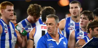 North Melbourne’s Clarkson lifts lid on heated McKercher exchange MELBOURNE, AUSTRALIA - APRIL 03: Alastair Clarkson, Senior Coach of the Kangaroos talks to his players during the round four AFL match between North Melbourne Kangaroos and Carlton Blues at Marvel Stadium, on April 03, 2026, in Melbourne, Australia. (Photo by Quinn Rooney/Getty Images)