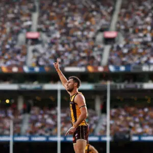 MELBOURNE, AUSTRALIA - APRIL 06: Jack Gunston of the Hawks celebrates a goal during the round four AFL match between Hawthorn Hawks and Geelong Cats at Melbourne Cricket Ground, on April 06, 2026, in Melbourne, Australia. (Photo by Morgan Hancock/AFL Photos/via Getty Images)