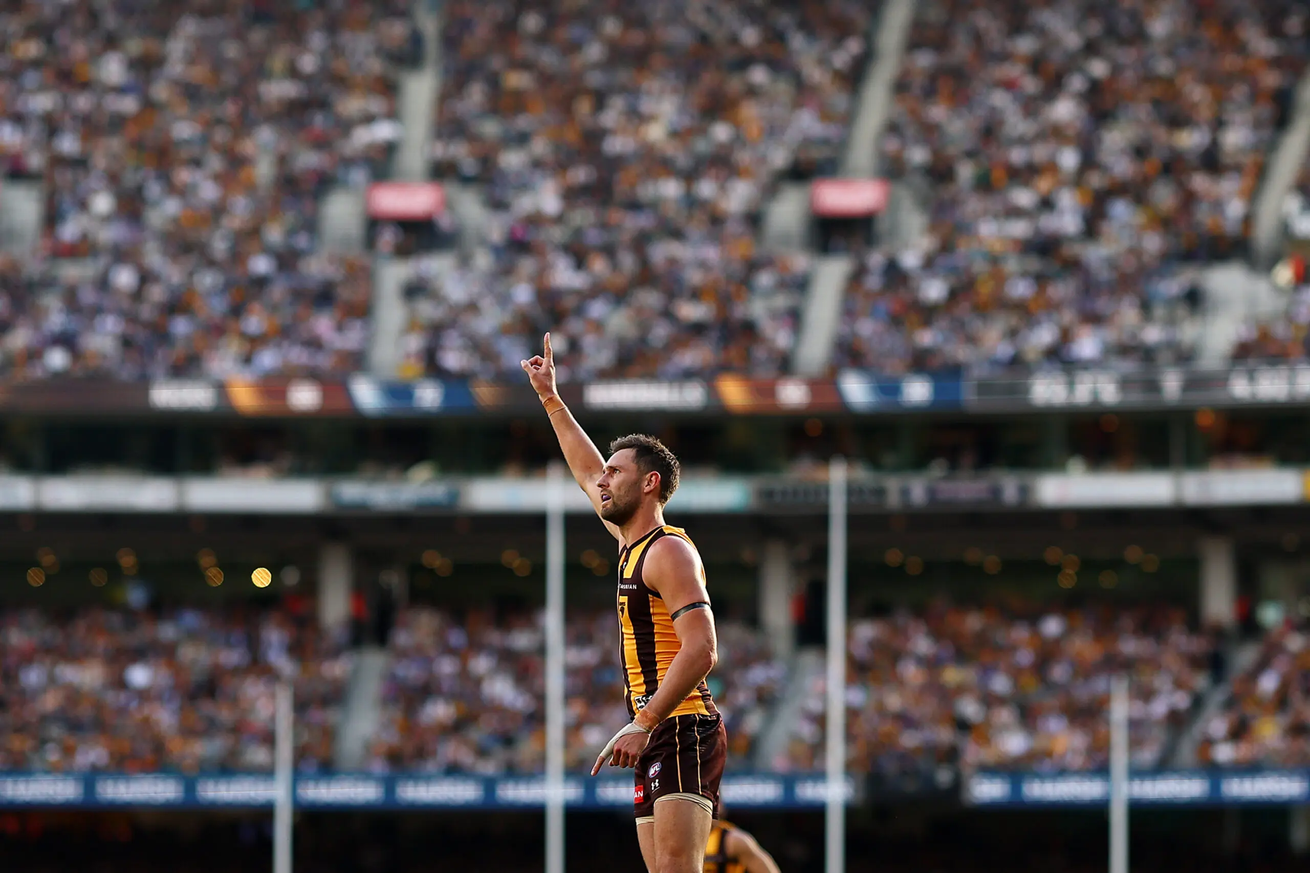 MELBOURNE, AUSTRALIA - APRIL 06: Jack Gunston of the Hawks celebrates a goal during the round four AFL match between Hawthorn Hawks and Geelong Cats at Melbourne Cricket Ground, on April 06, 2026, in Melbourne, Australia. (Photo by Morgan Hancock/AFL Photos/via Getty Images)