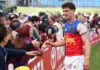ADELAIDE, AUSTRALIA - APRIL 11: Jarrod Berry of the Lions with fans during the 2026 AFL Round 05 match between the North Melbourne Kangaroos and the Brisbane Lions at Barossa Park on April 11, 2026 in Adelaide, Australia. (Photo by James Wiltshire/AFL Photos via Getty Images)
