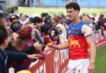 ADELAIDE, AUSTRALIA - APRIL 11: Jarrod Berry of the Lions with fans during the 2026 AFL Round 05 match between the North Melbourne Kangaroos and the Brisbane Lions at Barossa Park on April 11, 2026 in Adelaide, Australia. (Photo by James Wiltshire/AFL Photos via Getty Images)