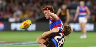 Bulldogs jet grounded after surprise inclusion ADELAIDE, AUSTRALIA - APRIL 10: Ed Richards of the Bulldogs and Cam Mackenzie of the Hawks during the 2026 AFL Round 05 match between the Hawthorn Hawks and the Western Bulldogs at Adelaide Oval on April 10, 2026 in Adelaide, Australia. (Photo by Sarah Reed/AFL Photos via Getty Images)