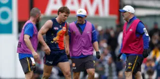 Horror news for Eagles recruit as scans reveal the worst ADELAIDE, AUSTRALIA - APRIL 12: Deven Robertson of the Eagles is seen with medical staff during the 2026 AFL Round 05 match between the Geelong Cats and the West Coast Eagles at Norwood Oval on April 12, 2026 in Adelaide, Australia. (Photo by Michael Willson/AFL Photos via Getty Images)