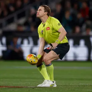 ADELAIDE, AUSTRALIA - APRIL 11: Nick Foot, AFL Field Umpire throws the ball in the air during the 2026 AFL Round 05 match between the Port Adelaide Power and the St Kilda Saints at Adelaide Oval on April 11, 2026 in Adelaide, Australia. (Photo by Michael Willson/AFL Photos via Getty Images)