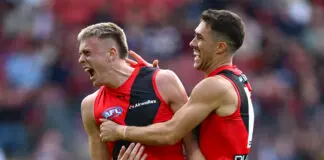 Drought OVER: Essendon stuns Melbourne ADELAIDE, AUSTRALIA - APRIL 11: Nate Caddy of the Bombers is congratulated by Jade Gresham of the Bombers after kicking a goal during the round five AFL match between Essendon Bombers and Melbourne Demons at Adelaide Oval, on April 11, 2026, in Adelaide, Australia. (Photo by Quinn Rooney/Getty Images)