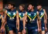 MELBOURNE, AUSTRALIA - APRIL 12: Noah Williams of the AFL National Academy walks out onto the field during the Marsh AFL National Academy Boys match between Australia U18 and North Melbourne VFL at Arden Street Ground on April 12, 2026 in Melbourne, Australia. (Photo by Josh Chadwick/AFL Photos/via Getty Images)