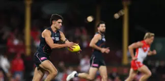 AFL Tribunal: Young Giant learns fate for ill-time smother SYDNEY, AUSTRALIA - APRIL 17: Joe Fonti of the Giants runs the ball during the round six AFL match between Sydney Swans and Greater Western Sydney Giants at SCG, on April 17, 2026, in Sydney, Australia. (Photo by Cameron Spencer/Getty Images)